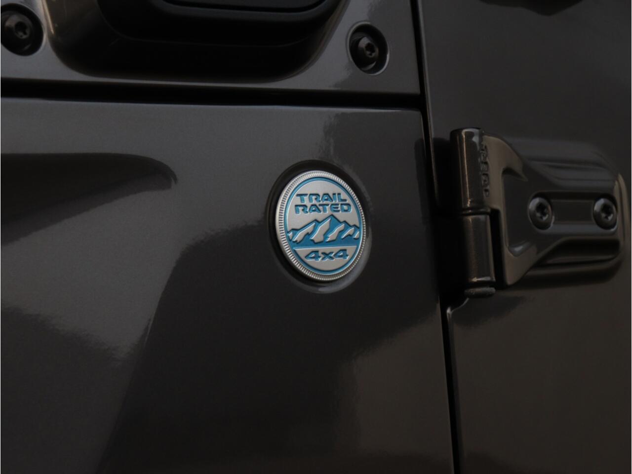 Jeep WRANGLER Unlimited 4xe 380 PK Sahara | Leder | Soft Top | Camera | 18"