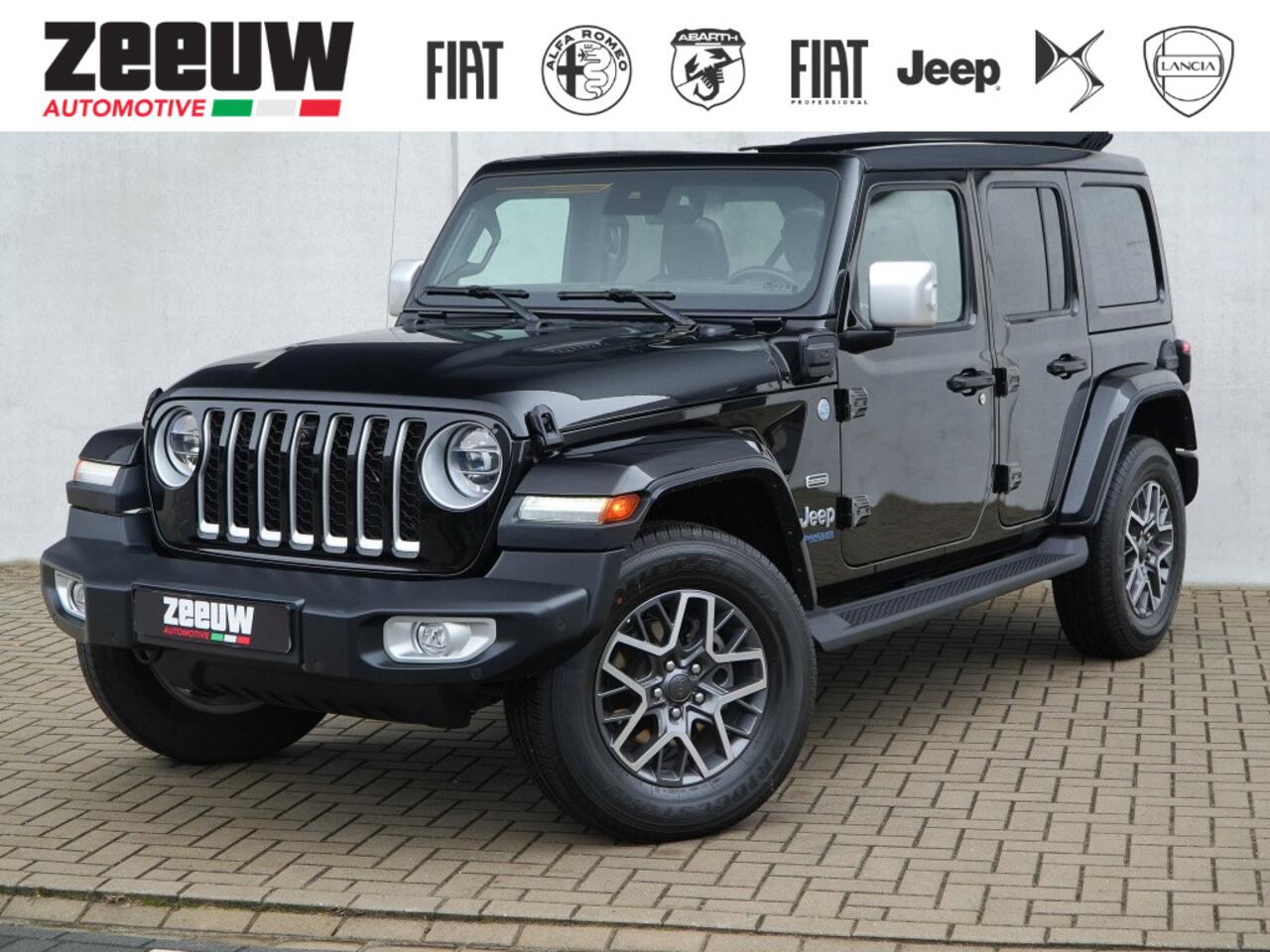 Jeep WRANGLER Unlimited 4xe 380 PK Sahara | Leder | Soft Top | Overland | Camera | 18"