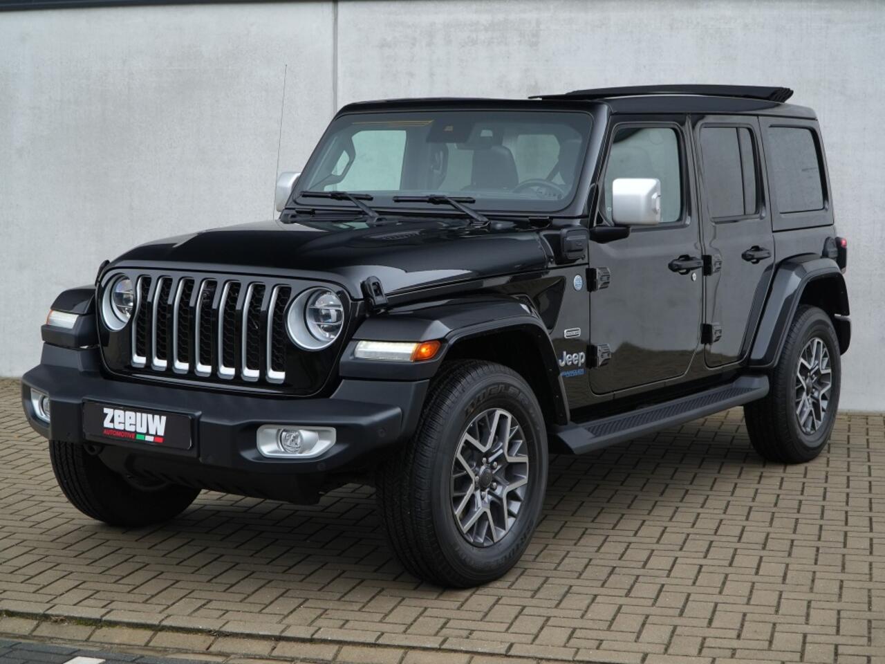 Jeep WRANGLER Unlimited 4xe 380 PK Sahara | Leder | Soft Top | Overland | Camera | 18"