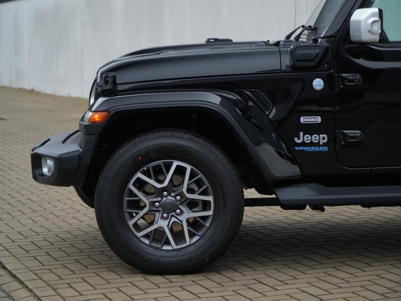 Jeep WRANGLER Unlimited 4xe 380 PK Sahara | Leder | Soft Top | Overland | Camera | 18"