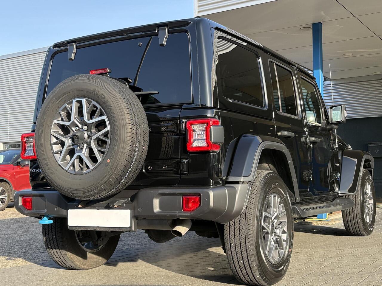 Jeep WRANGLER Unlimited 4xe 380pk Sahara PHEV | Leder | Stoel- & Stuurverwarming | Navigatie | Afneembaar Dak |