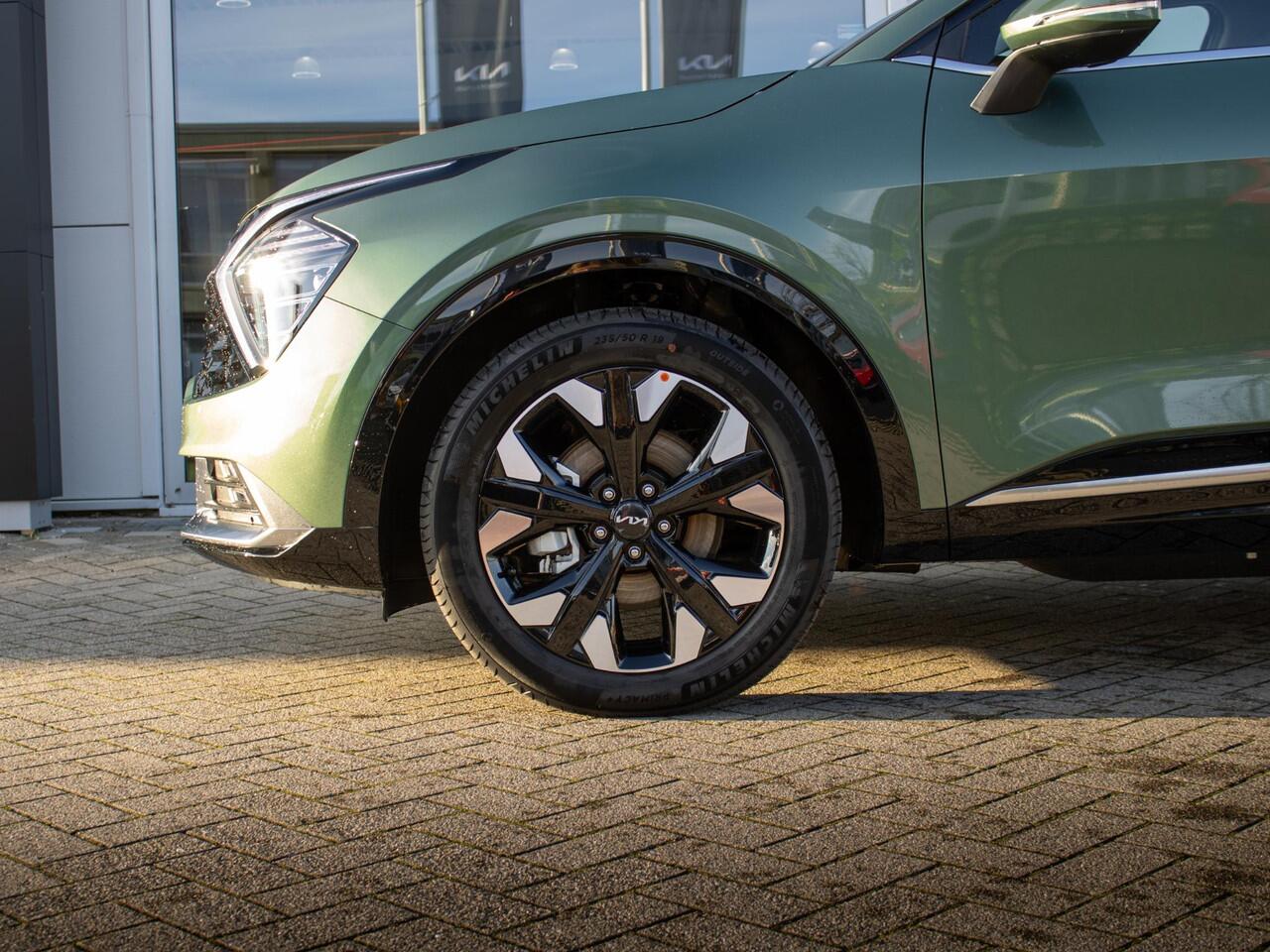 KIA SPORTAGE 1.6 T-GDi Plug-in Hybrid AWD DynamicPlusLine | OP VOORRAAD | Schuifkanteldak | Stoelverwarming |