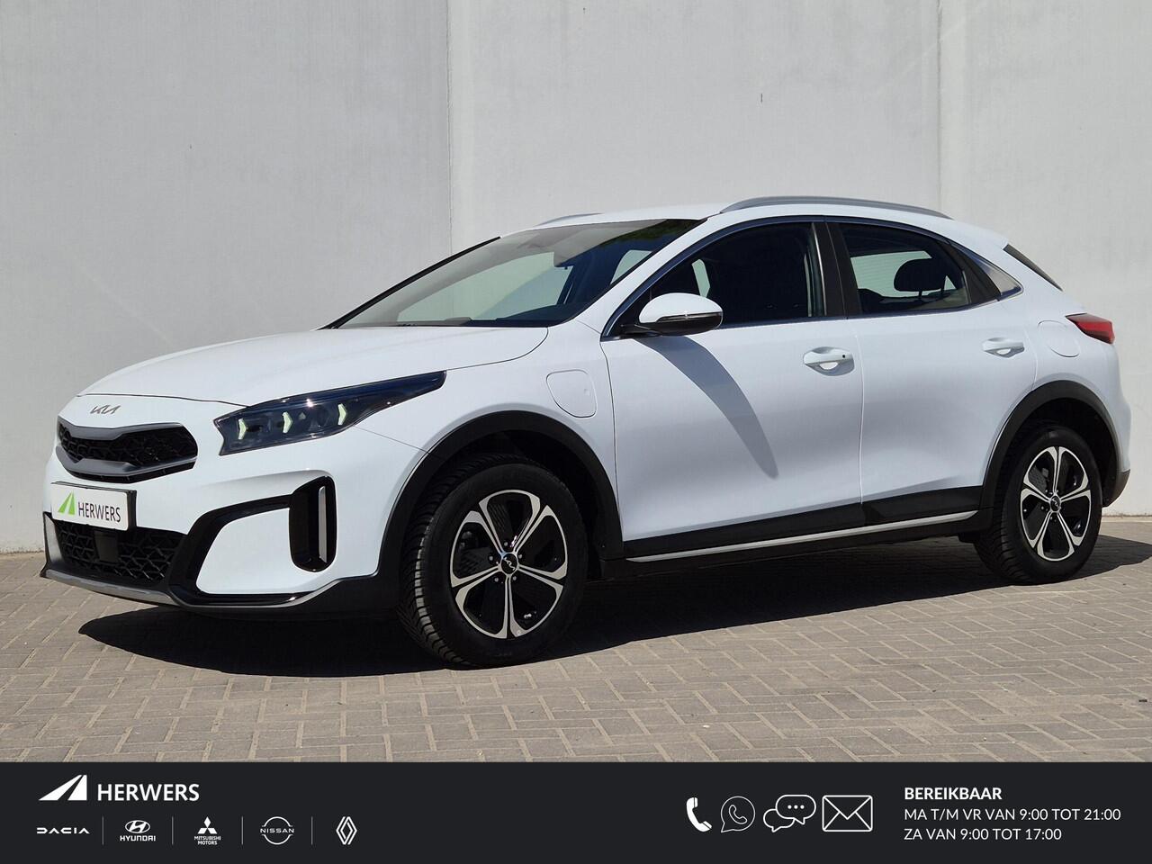 KIA Xceed 1.6 GDi PHEV Plug-in DynamicLine Facelift Automaat / 7 jaar Fabrieksgarantie / Stuur- en stoelverwarming / Achteruitrijcamera / Navigatie via Apple Carplay of Android Auto / Adaptief cruise control / Trekgewicht 1300 kg / Keyless Entry/Start /