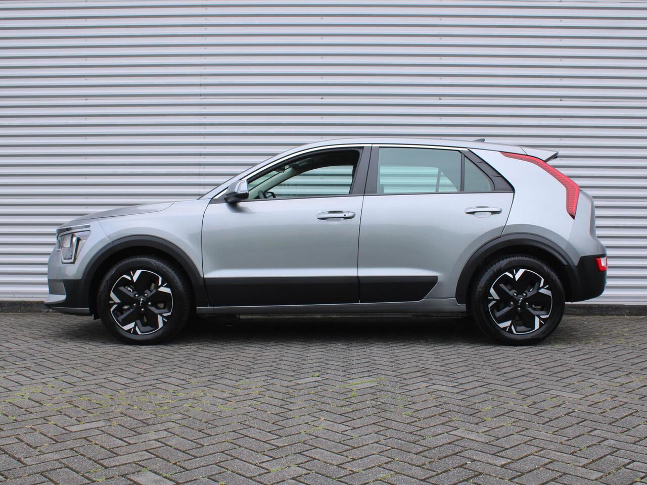 KIA e-Niro EV Light Edition 64.8 kWh | Airco | Cruise | Navi | Camera | PDC | 17" LM | All season banden | 17% bijtelling |