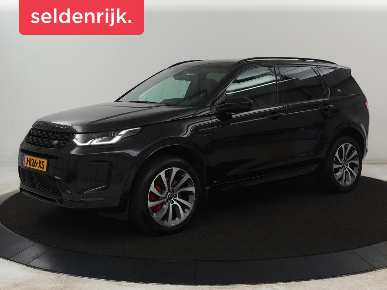 Land Rover DISCOVERY SPORT P300e 1.5 R-Dynamic SE | SOH 86% | Panoramadak | Head-Up | Leder | Trekhaak | Matrix LED | Stoelverwarming | Keyless | Park Assist | Carplay | Navigatie | Memory | PHEV | Plug In