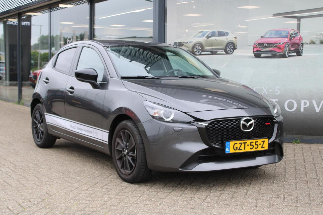Mazda 2 1.5 e-SkyActiv-G 90 Homura , Demovoordeel ¤3.340 -, Apple Carplay, LMV 16 Inch, Camera, PDC, Clima, Cruise, Stuur/Stoelverwarming, BSM, LKA