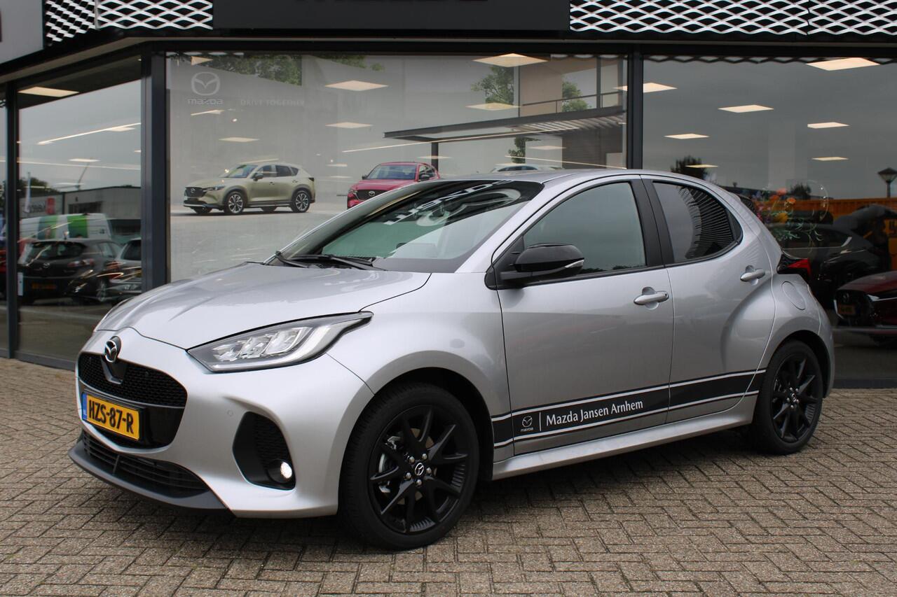 Mazda 2 Hybrid 1.5 Homura , Demovoordeel ¤ 3.000,-, Automaat, Apple Carplay, Clima, Adap.Cruise, LMV 17 Inch, Camera, PDC, Stuur/Stoelverwarming