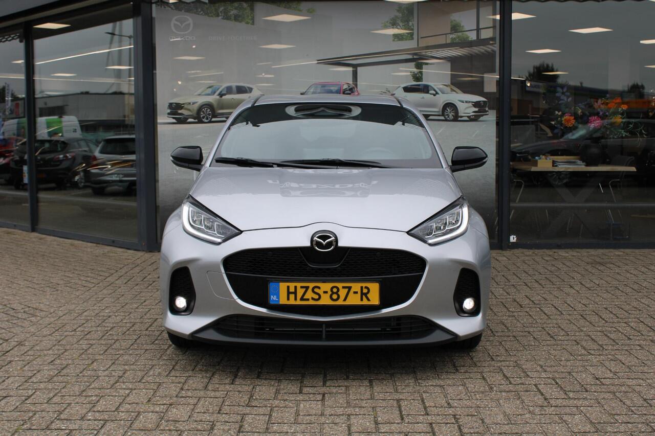 Mazda 2 Hybrid 1.5 Homura , Demovoordeel ¤ 3.000,-, Automaat, Apple Carplay, Clima, Adap.Cruise, LMV 17 Inch, Camera, PDC, Stuur/Stoelverwarming