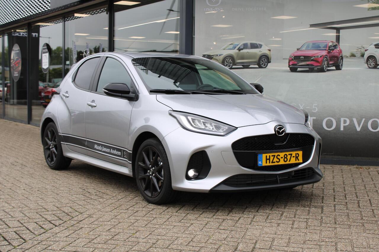 Mazda 2 Hybrid 1.5 Homura , Demovoordeel ¤ 3.000,-, Automaat, Apple Carplay, Clima, Adap.Cruise, LMV 17 Inch, Camera, PDC, Stuur/Stoelverwarming