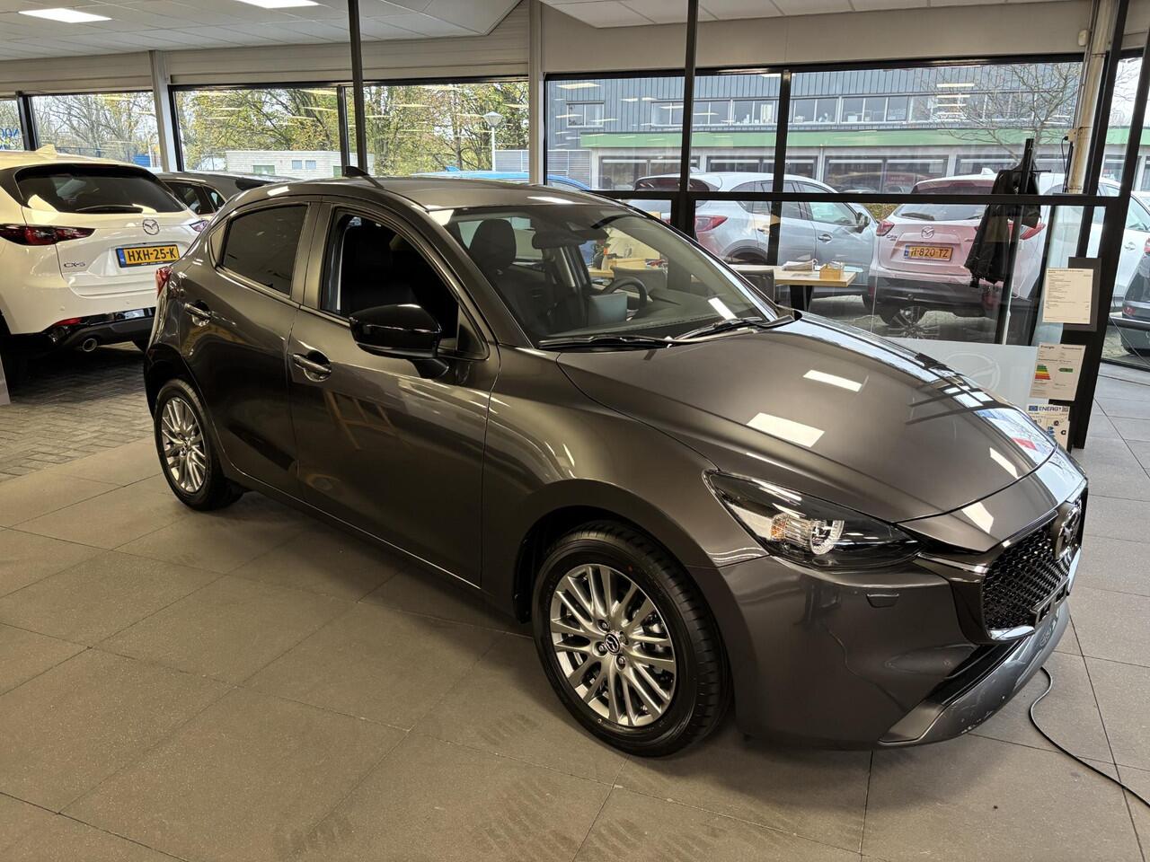 Mazda 2 1.5 e-SkyActiv-G 90 Homura , Voorraadvoordeel ¤ 1.350-, Apple Carplay, LMV 16 Inch, Camera, PDC, Clima, Cruise, Stuur/Stoelverwarming, BSM,