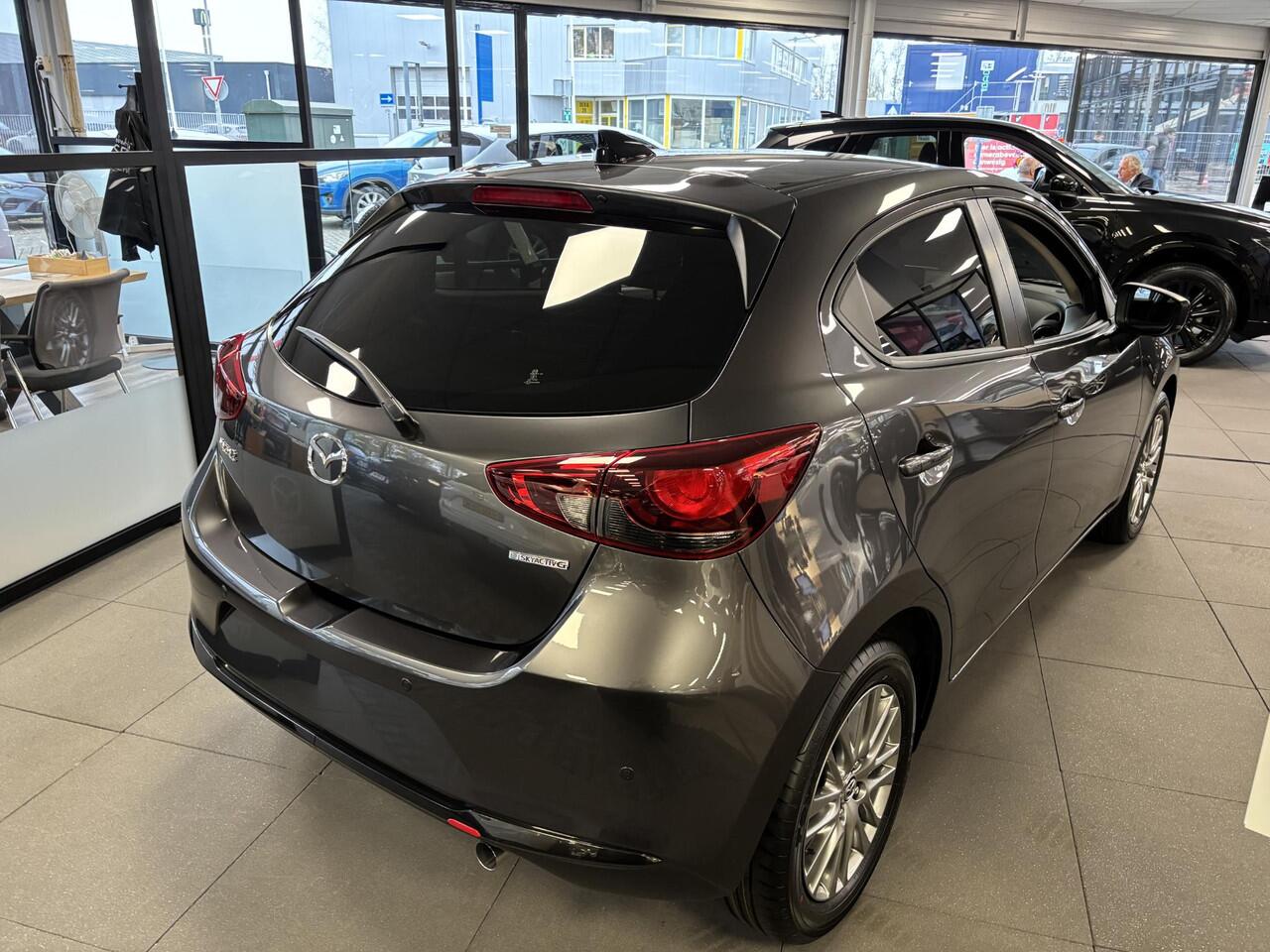 Mazda 2 1.5 e-SkyActiv-G 90 Homura , Voorraadvoordeel ¤ 1.350-, Apple Carplay, LMV 16 Inch, Camera, PDC, Clima, Cruise, Stuur/Stoelverwarming, BSM,