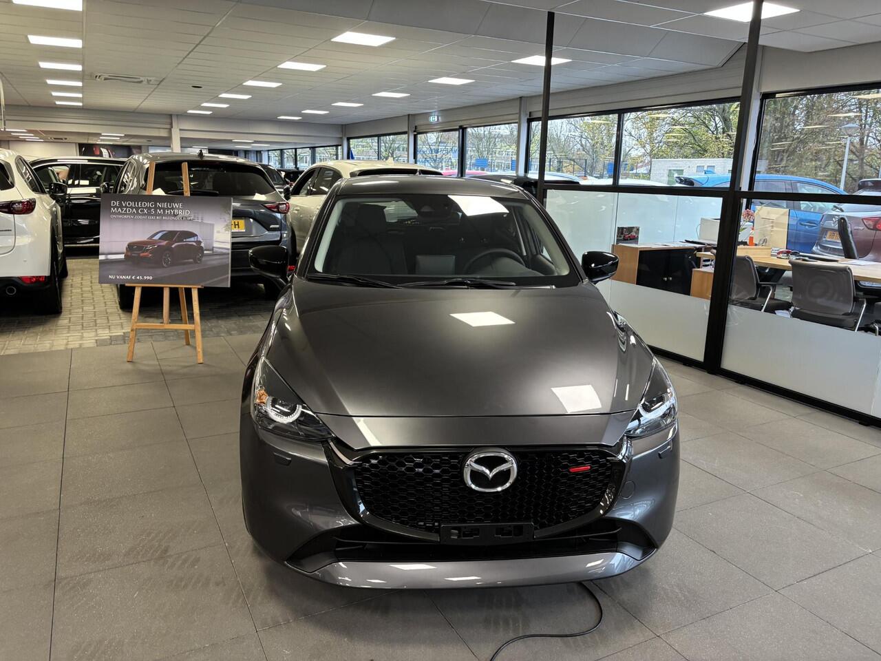 Mazda 2 1.5 e-SkyActiv-G 90 Homura , Voorraadvoordeel ¤ 1.350-, Apple Carplay, LMV 16 Inch, Camera, PDC, Clima, Cruise, Stuur/Stoelverwarming, BSM,