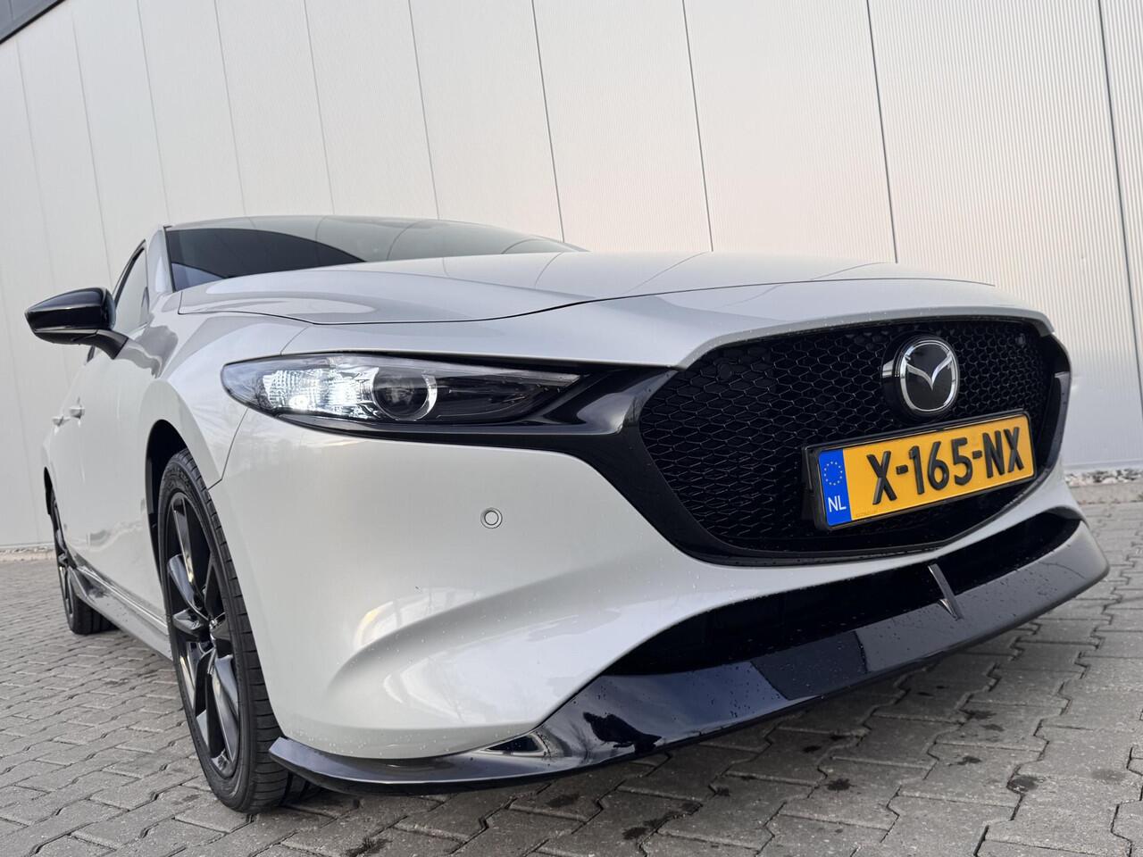 Mazda 3 2.0 e-SkyActiv-G M Hybrid 150 Homura / Apple Carplay/Android Auto / Cruise control adaptief / Kunstlederen interieurdelen / Navigatiesysteem full map / Electronic climate controle / Afneembare trekhaak - trekgewicht geremd 1300 kg /