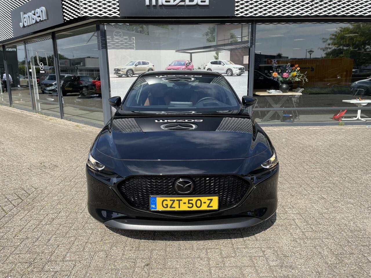 Mazda 3 HB 2.0 e-SkyActiv-X 186 M Hybrid Nagisa , Demovoordeel ¤5.985,-, Jansen Performance uitvoering, Bruin Leder, Bose, Navi, Adap.Cruise, Clima, Apple Carplay, Camera, PDC, HUD, Stoelverwarming, 18" LMV