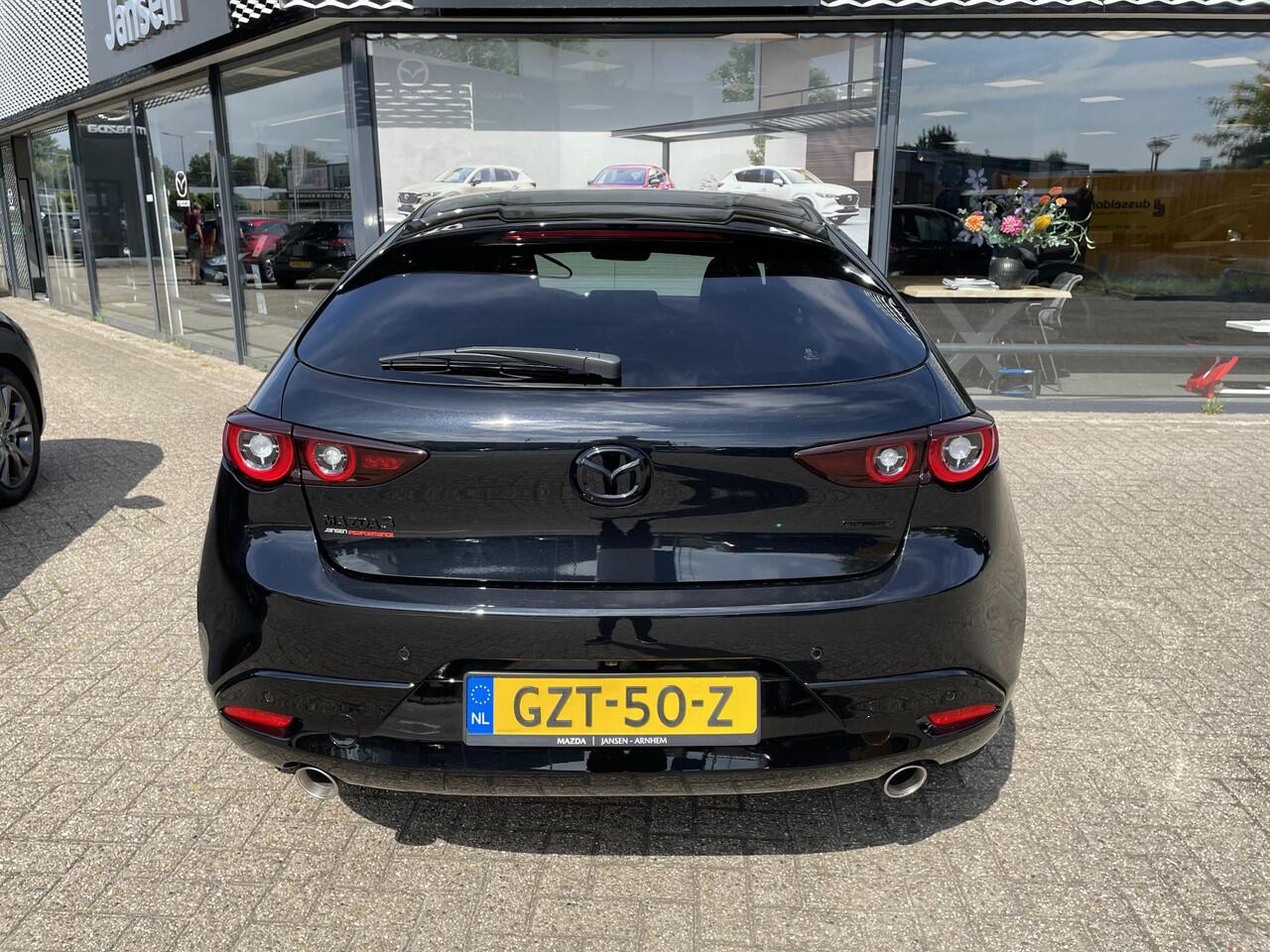 Mazda 3 HB 2.0 e-SkyActiv-X 186 M Hybrid Nagisa , Demovoordeel ¤5.985,-, Jansen Performance uitvoering, Bruin Leder, Bose, Navi, Adap.Cruise, Clima, Apple Carplay, Camera, PDC, HUD, Stoelverwarming, 18" LMV