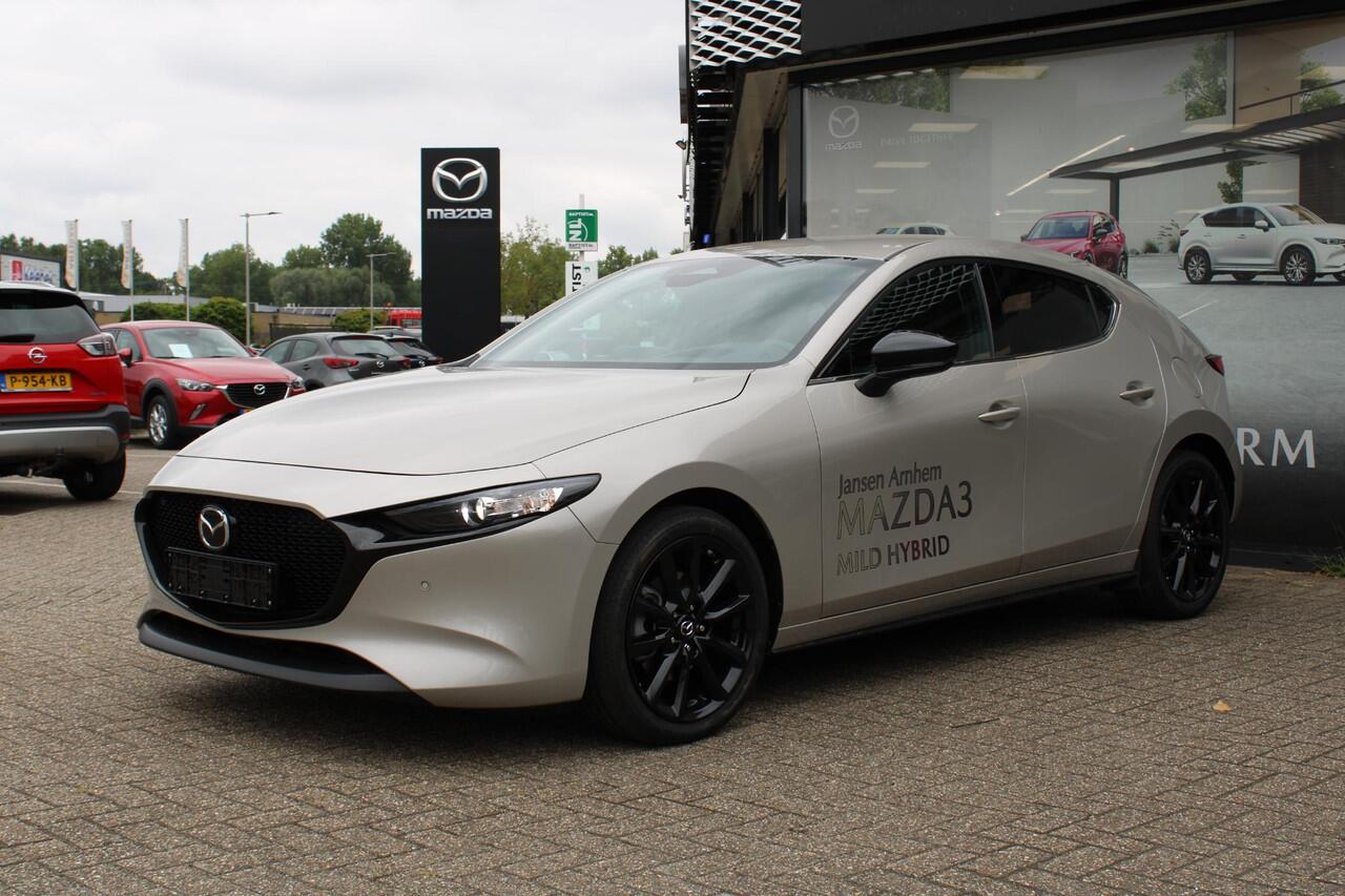 Mazda 3 2.0 e-SkyActiv-X M Hybrid 186 Nagisa Demovoordeel ¤ 5.000,-, Bruin Leder, Bose, Navi, Adap.Cruise, Clima, Apple Carplay, Camera, PDC, HUD, Stoelverwarming, 18" LMV