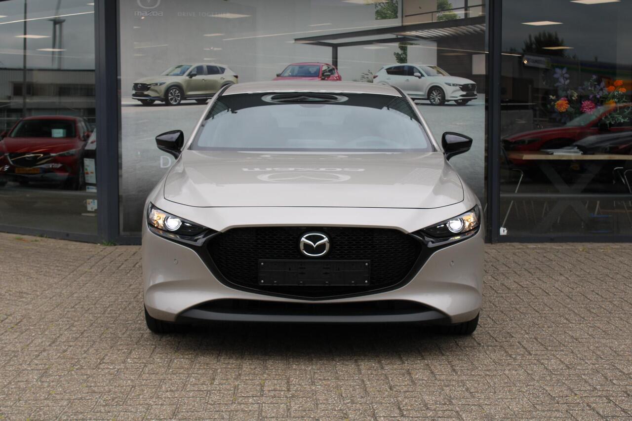Mazda 3 2.0 e-SkyActiv-X M Hybrid 186 Nagisa Demovoordeel ¤ 5.000,-, Bruin Leder, Bose, Navi, Adap.Cruise, Clima, Apple Carplay, Camera, PDC, HUD, Stoelverwarming, 18" LMV
