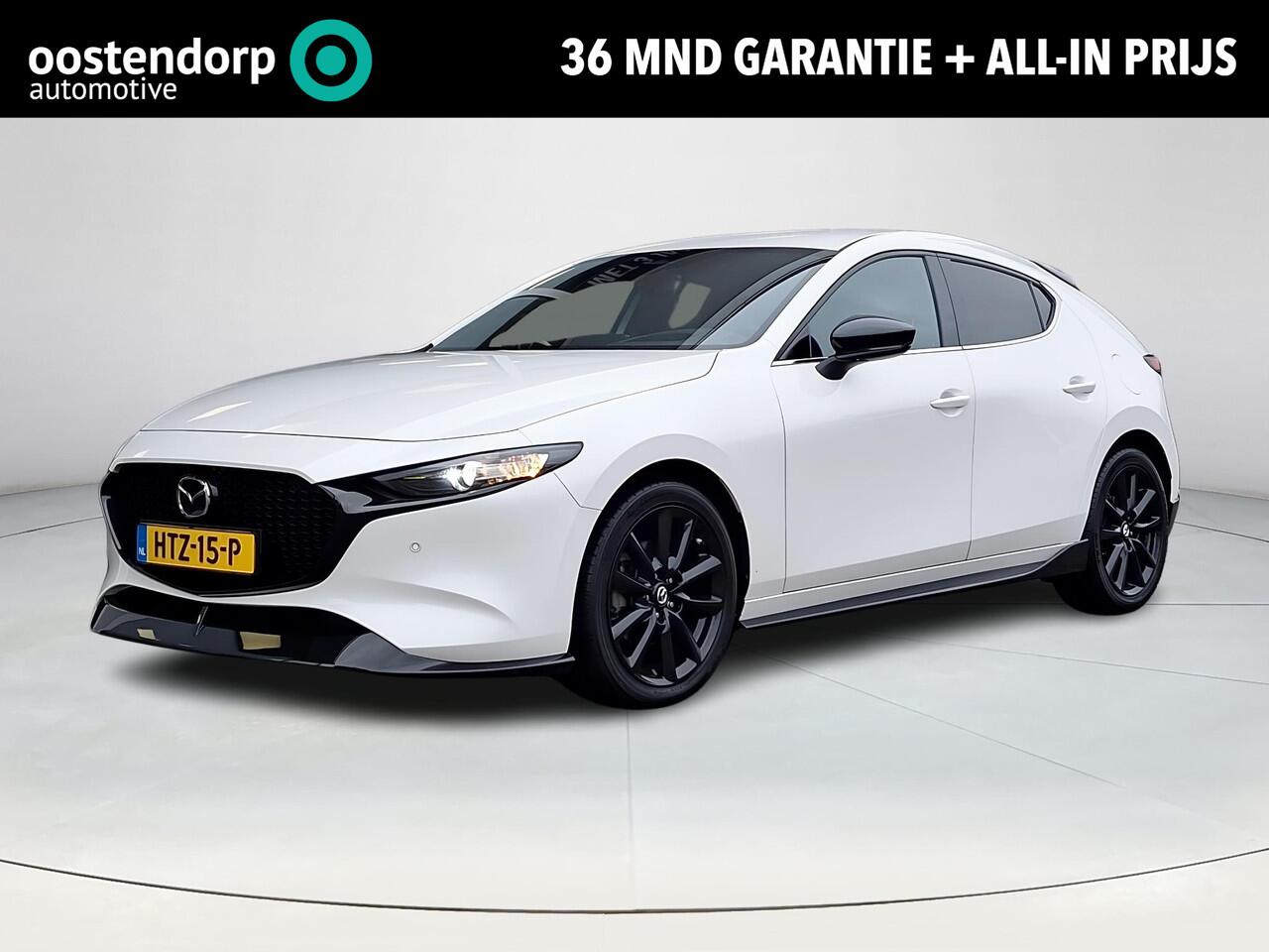 Mazda 3 2.0 e-SkyActiv-X M Hybrid 186 Nagisa | Aero pakket | Alcantara/Leder met stoelgeheugen | Achteruitrijcamera | Bose | HeadupDisplay | Navigatie en draadloze Applecarplay\Androidauto | Verlichte Dorpelbeschermers | Parelmoer Wit