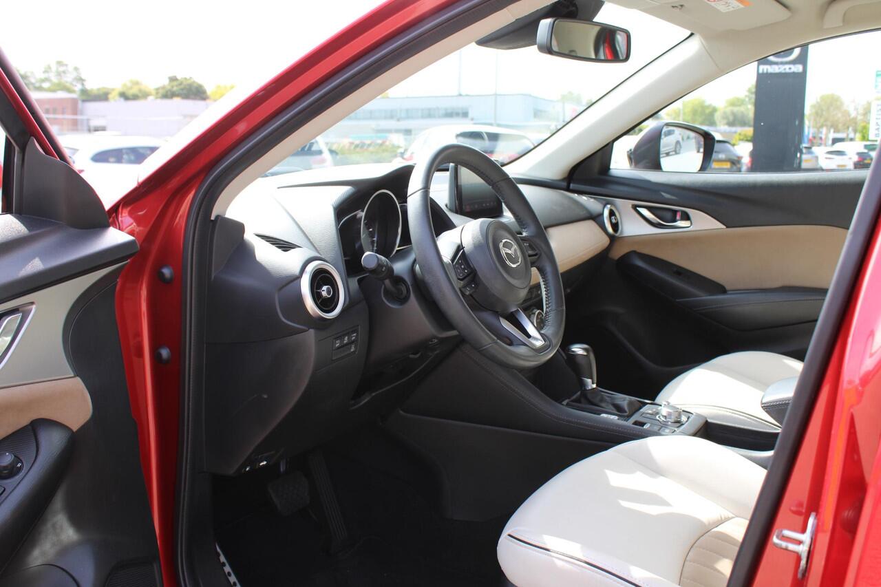 Mazda CX-3 2.0 SkyActiv-G 121 Luxury , Automaar, Trekhaak, Camera, Navi, Apple Carplay, Android Auto, Stoelverwarming, Cruise, LKA, PDC, LMV 18 Inch, Wit Leder