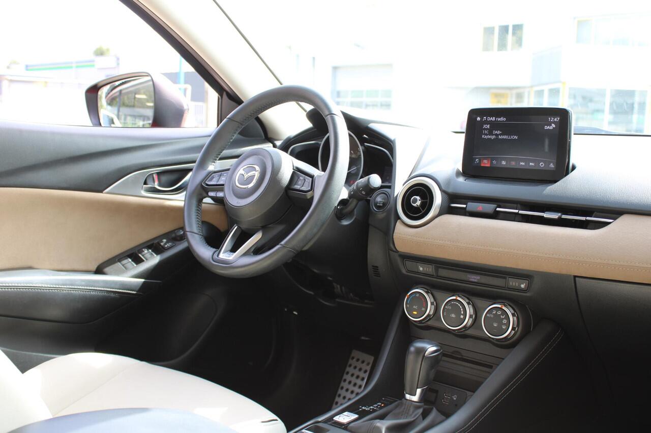 Mazda CX-3 2.0 SkyActiv-G 121 Luxury , Automaar, Trekhaak, Camera, Navi, Apple Carplay, Android Auto, Stoelverwarming, Cruise, LKA, PDC, LMV 18 Inch, Wit Leder