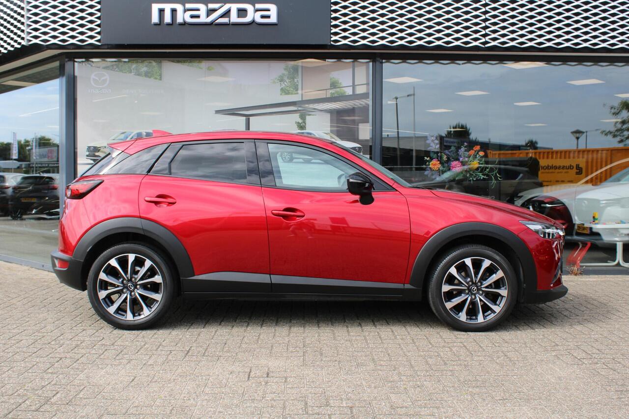 Mazda CX-3 2.0 SkyActiv-G 121 Luxury , Automaar, Trekhaak, Camera, Navi, Apple Carplay, Android Auto, Stoelverwarming, Cruise, LKA, PDC, LMV 18 Inch, Wit Leder