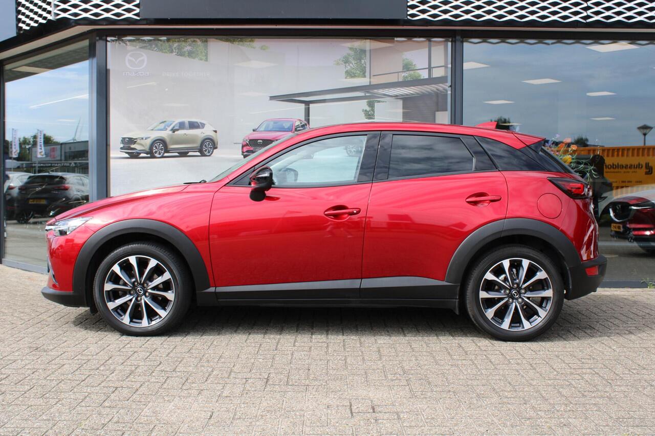 Mazda CX-3 2.0 SkyActiv-G 121 Luxury , Automaar, Trekhaak, Camera, Navi, Apple Carplay, Android Auto, Stoelverwarming, Cruise, LKA, PDC, LMV 18 Inch, Wit Leder
