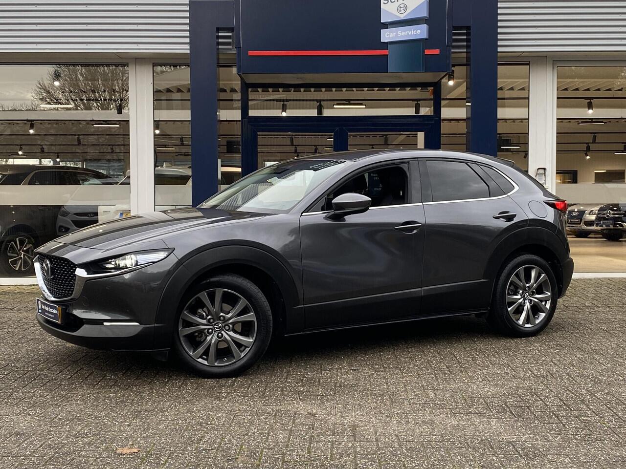 Mazda CX-30 2.0 e-SkyActiv-X M Hybrid Luxury / Automaat / NL-Auto / 1e-Eigenaar / Adaptieve Cruise-Control Stop&Go / Stoelverwarming / Stuurverwarming / Elektr.-Stoelen met Geheugen / Climate-Control / Apple-Carplay & Android-Auto / Head-Up-Display / DAB Radio-Blueto