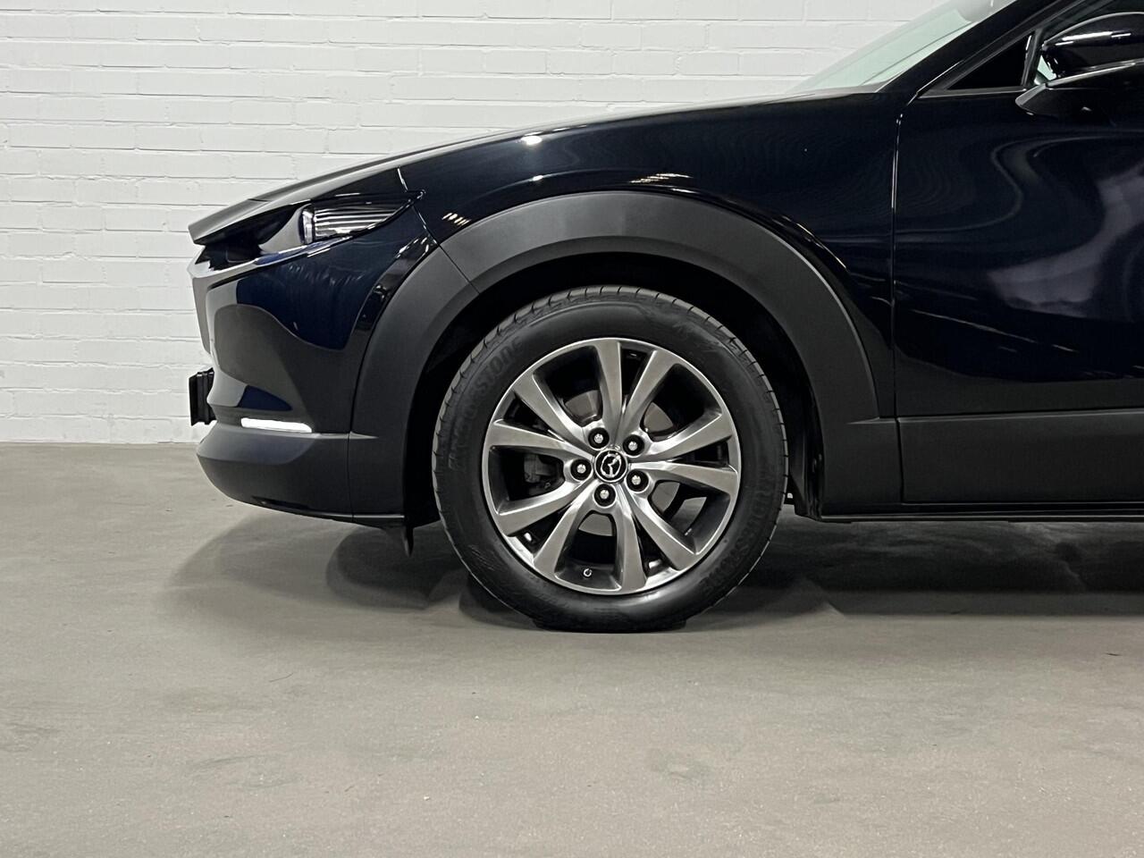 Mazda CX-30 2.0 e-SkyActiv-X M Hybrid AWD Luxury Trekhaak | Adapt. cruise | Stoel-/stuurverwarming | Carplay | 360 camera | Leder