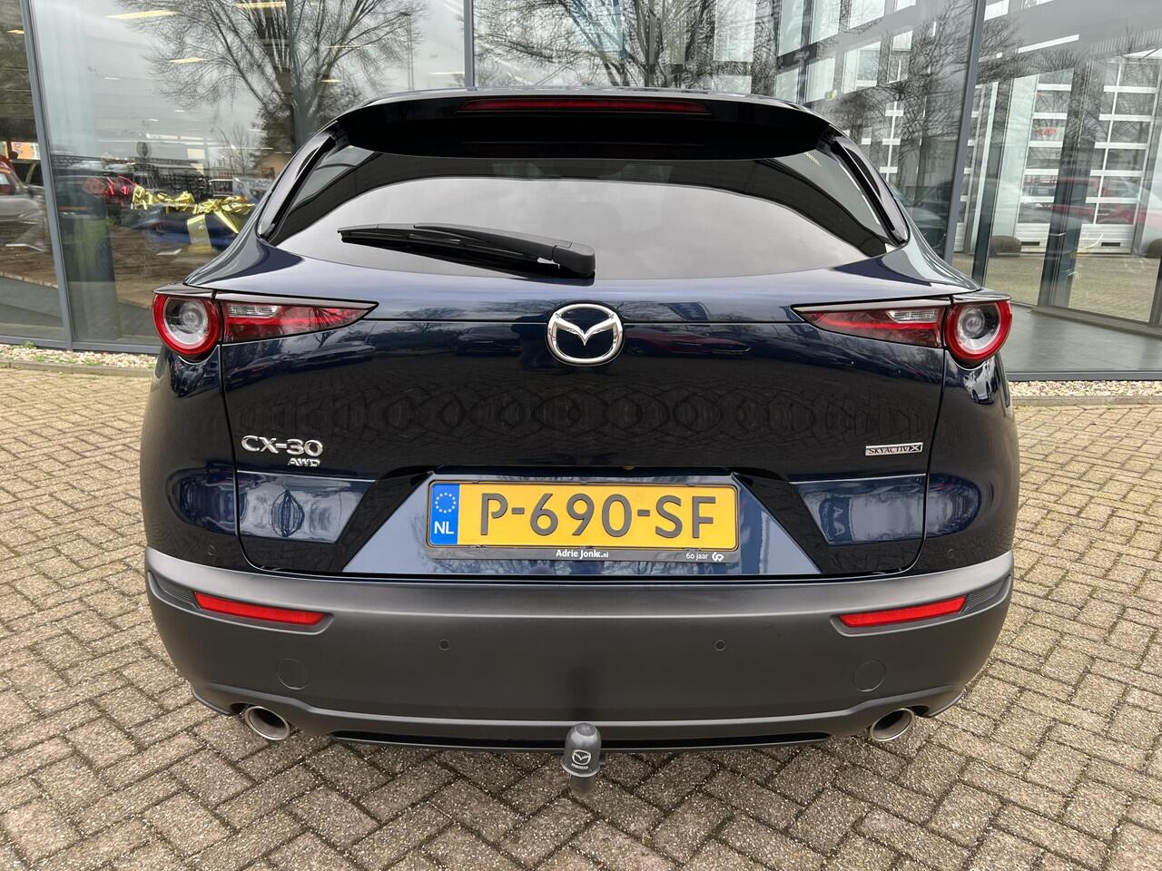 Mazda CX-30 2.0 e-SkyActiv-X M Hybrid AWD Luxury AUTOMAAT | TREKHAAK | 360 CAMERA | EL. A.KLEP | 18"VELGEN | AWD | APPLE CARPLAY | ADROID AUTO | STUUR- EN STOEL VERWARMING