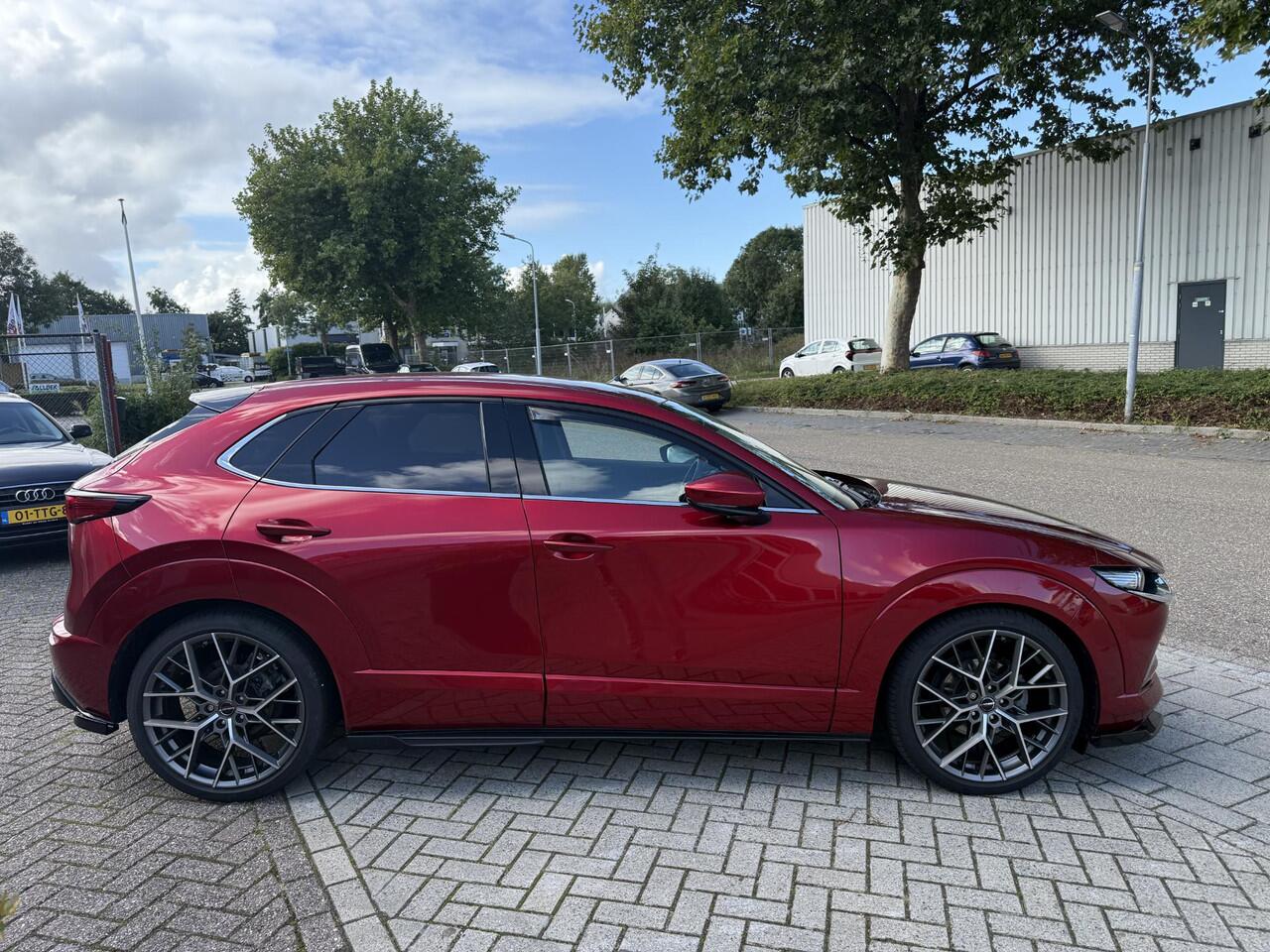 Mazda CX-30 2.0 e-SkyActiv-G M Hybrid Luxury | Bose | Head-up Display | Afneembare Trekhaak | Adaptief Cruise Control |