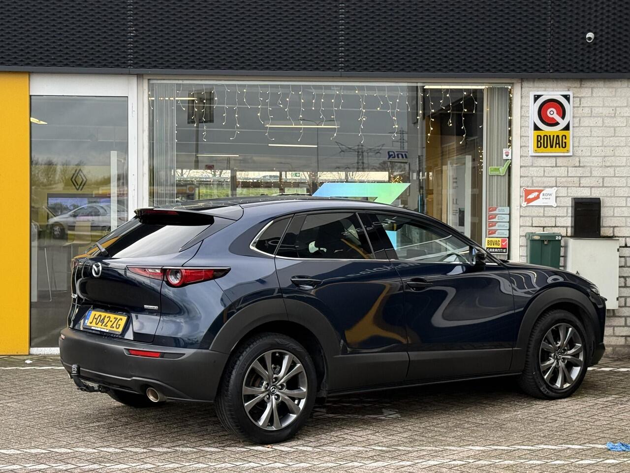 Mazda CX-30 2.0 e-SkyActiv-X M Hybrid Luxury | NAP | elektrisch glazen schuif-/kanteldak | Leer | Stoel & stuur verwarming | 360 graden camera | Bose Audio | Memory Stoelen |