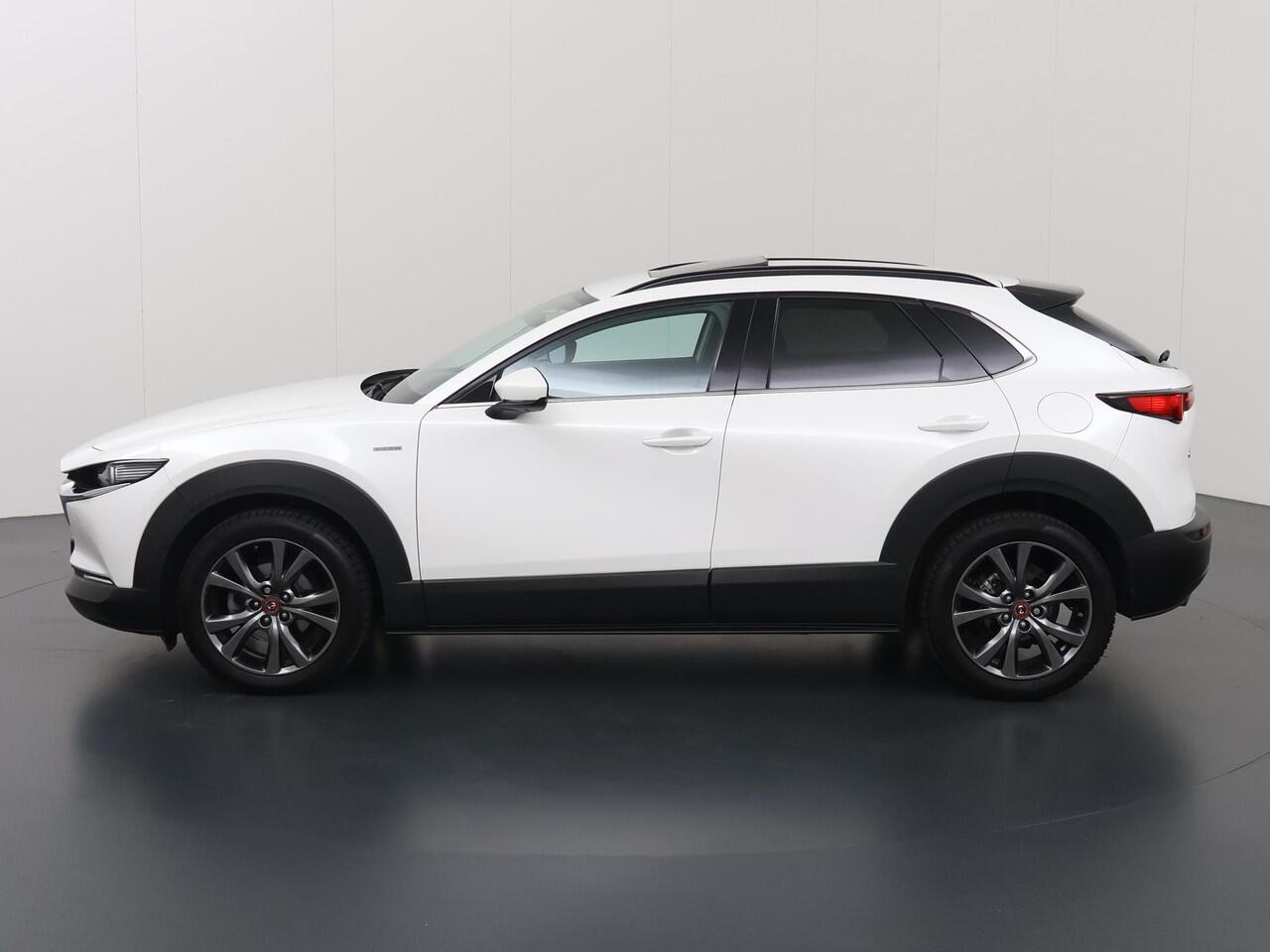 Mazda CX-30 2.0 e-SkyActiv-X M Hybrid100th Anniversary Ed. | Schuif/Kanteldak | Lederen Interieur | Navigatie | 360 Camera | DAB | Stoel/Stuurverwarming | Adaptieve Cruise Control | Ele.verstelbare stoel + geheugen | Bose Audio |