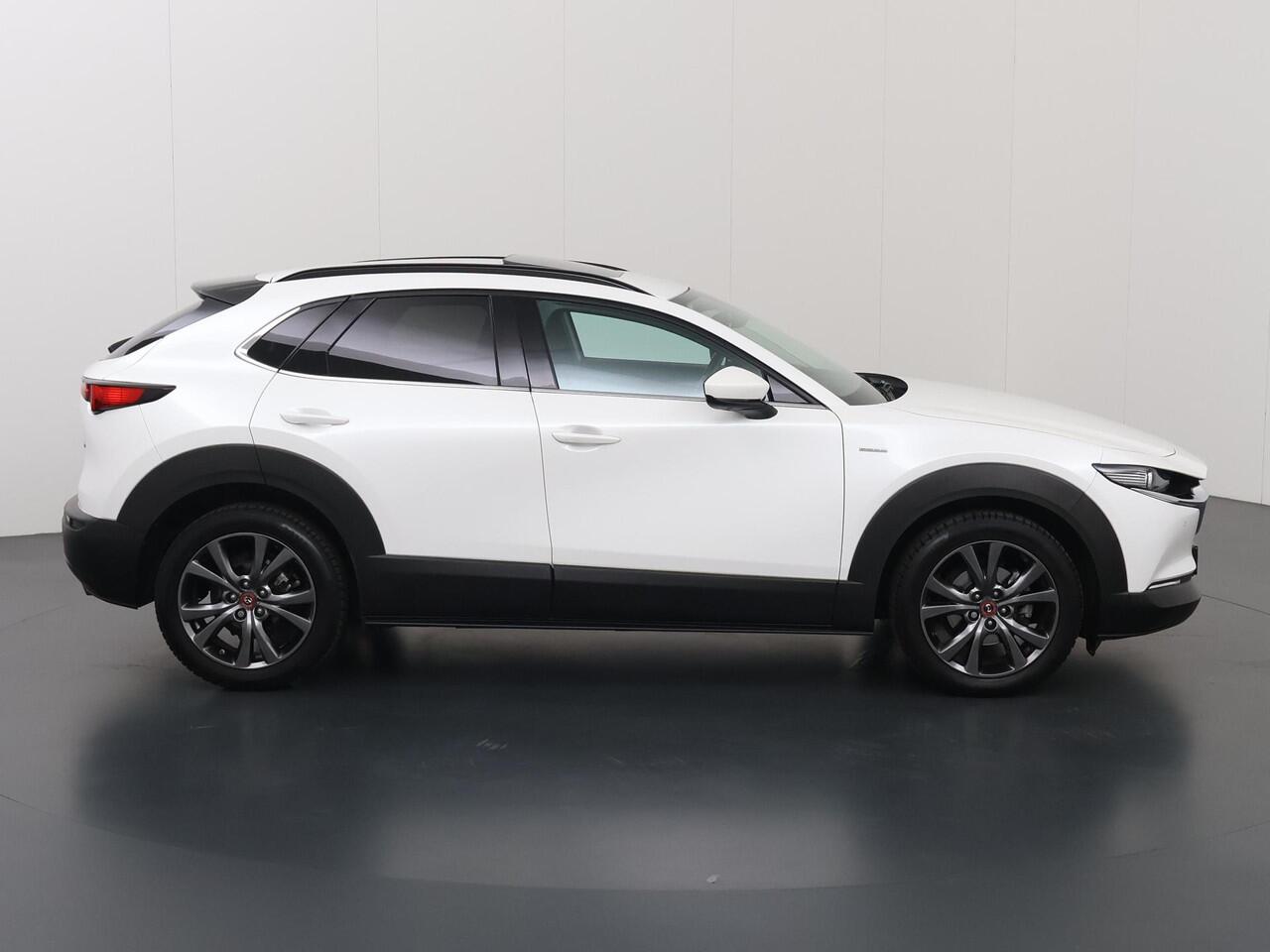 Mazda CX-30 2.0 e-SkyActiv-X M Hybrid100th Anniversary Ed. | Schuif/Kanteldak | Lederen Interieur | Navigatie | 360 Camera | DAB | Stoel/Stuurverwarming | Adaptieve Cruise Control | Ele.verstelbare stoel + geheugen | Bose Audio |