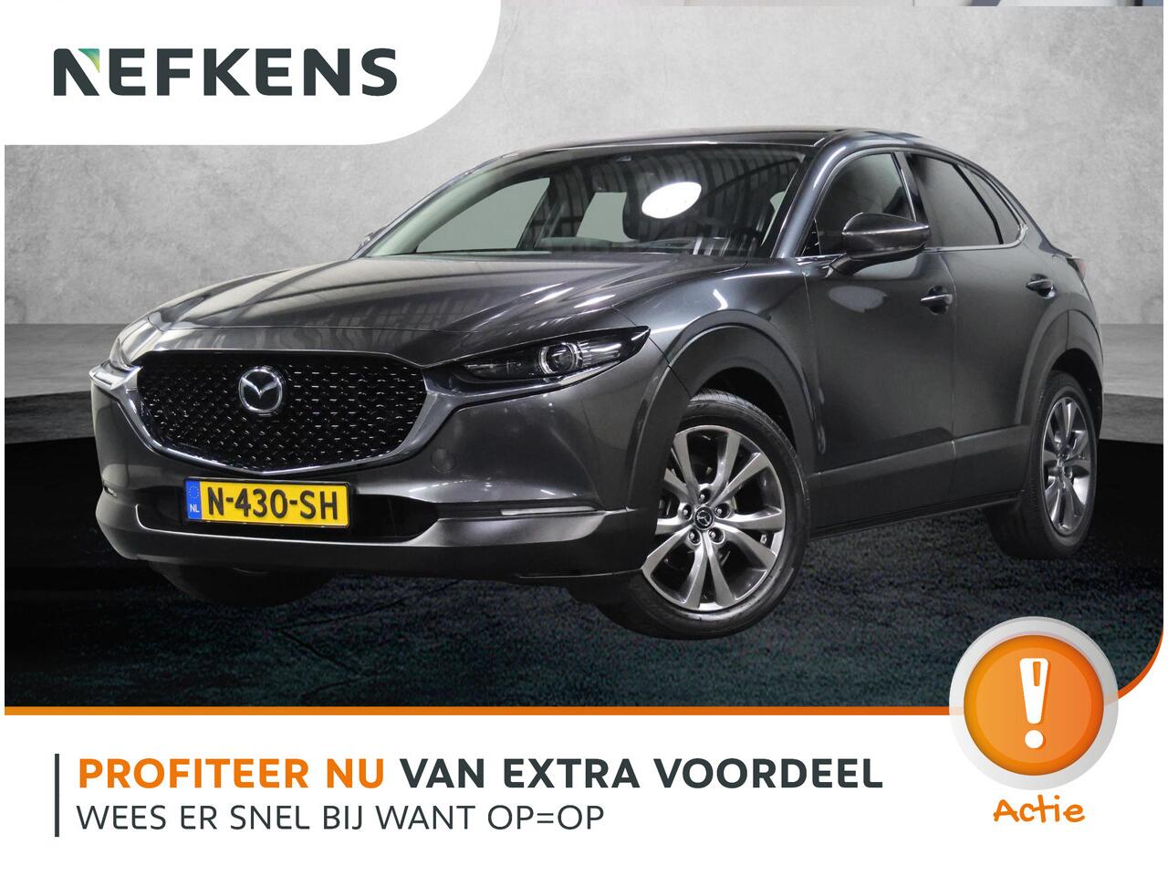 Mazda CX-30 186PK M Hybrid Luxury | 1ste eigenaar | AppleCarPlay/AndroidAuto | Armsteun | Head-Up Display | Navigatie | Stoel/StuurVerwarmd | Trekhaak | Camera | BOSE Sound | LEER | Dodehoekdetectie | Isofix | Privacy Glass | Electrische achterklep |