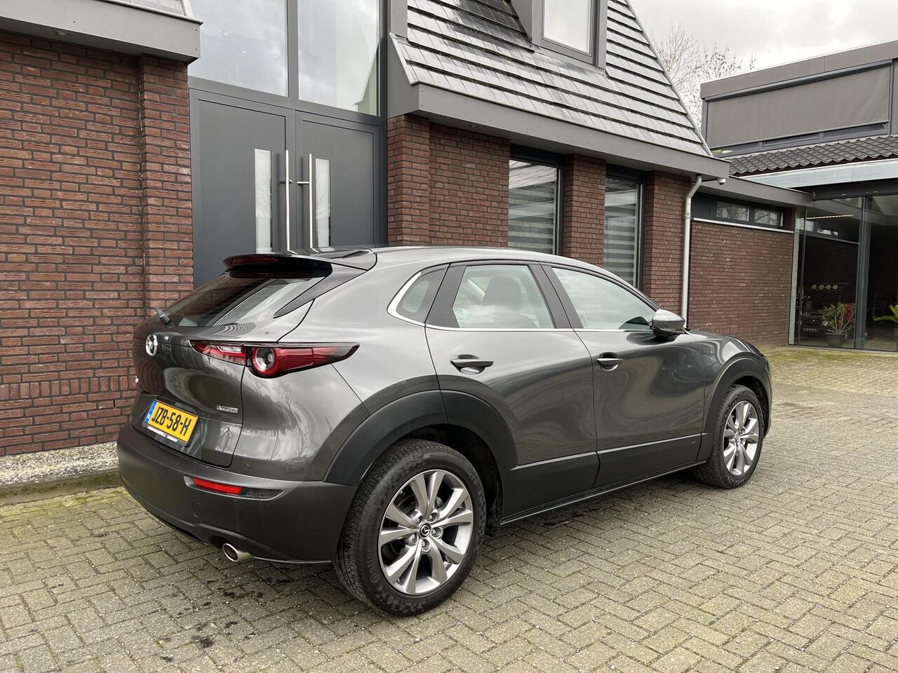 Mazda CX-30 2.0 e-SkyActiv-G M Hybrid Luxury NAV | ADAPTIVE CRUISE CONTROL | Ap­ple Car­Play & An­droid Auto | STOELVERW. | CAMERA