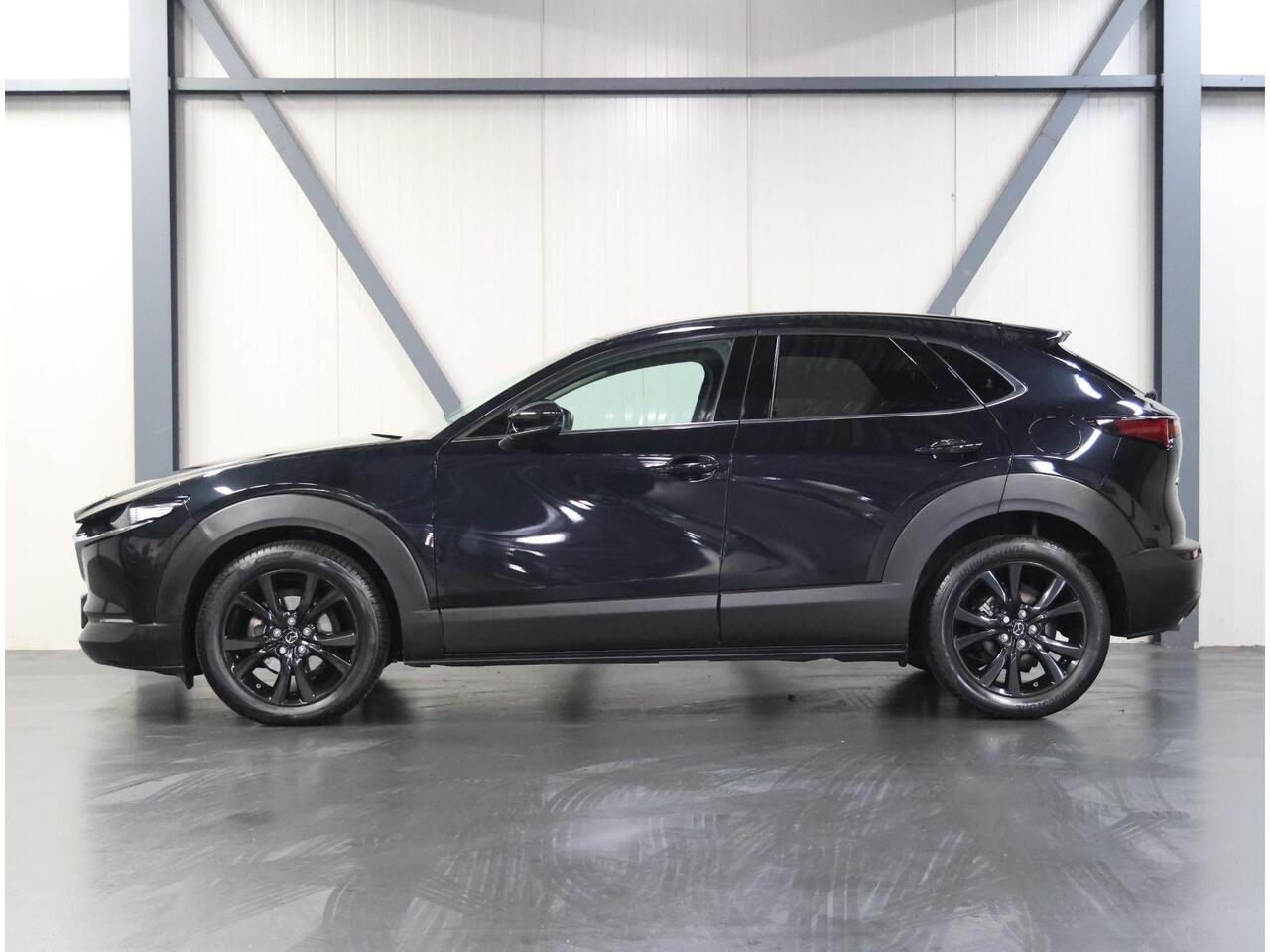 Mazda CX-30 186pk M Hybrid Sportive | 1ste eigenaar | Armsteun | Camera | StuurVerwarming | Adaptieve Cruise Control | Climate Control | Navigatie | Dodehoekdetectie | AUTOMAAT | Elektrische Achterklep | AppleCarplay/AndroidAuto