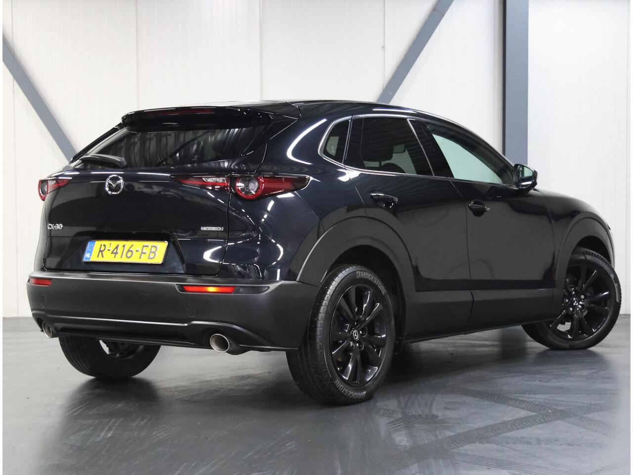 Mazda CX-30 186pk M Hybrid Sportive | 1ste eigenaar | Armsteun | Camera | StuurVerwarming | Adaptieve Cruise Control | Climate Control | Navigatie | Dodehoekdetectie | AUTOMAAT | Elektrische Achterklep | AppleCarplay/AndroidAuto