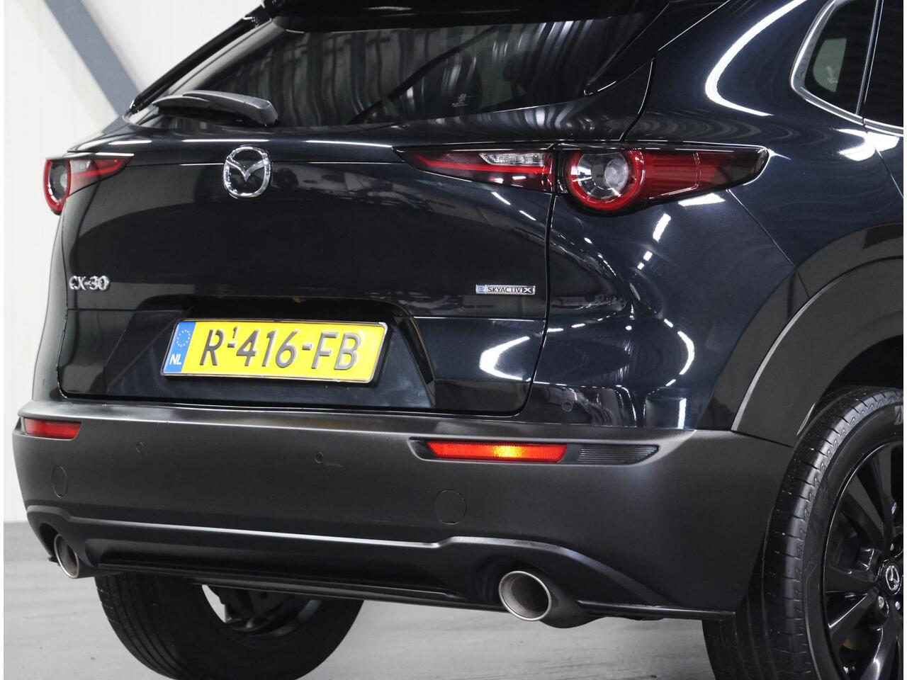 Mazda CX-30 186pk M Hybrid Sportive | 1ste eigenaar | Armsteun | Camera | StuurVerwarming | Adaptieve Cruise Control | Climate Control | Navigatie | Dodehoekdetectie | AUTOMAAT | Elektrische Achterklep | AppleCarplay/AndroidAuto