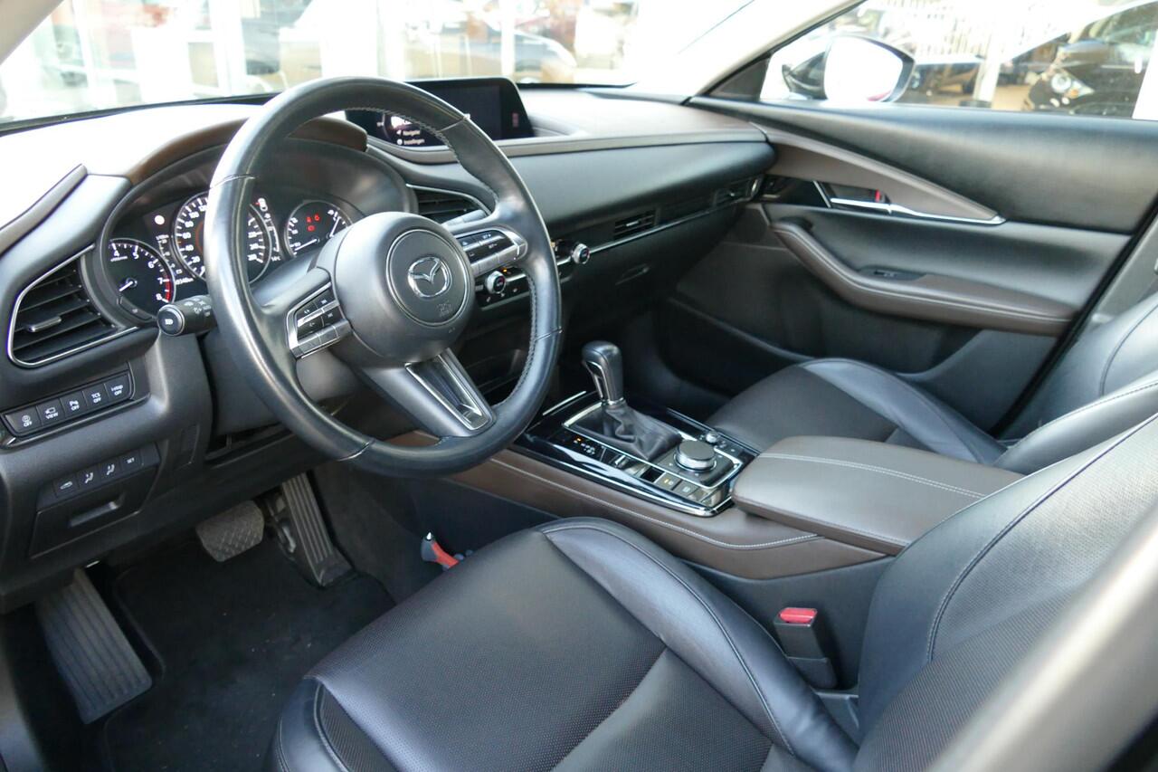 Mazda CX-30 2.0 e-SkyActiv-X M Hybrid Luxury | Schuifkanteldak | I-Activense pakket | Stuurwielverwarming | Rijklaarprijs |