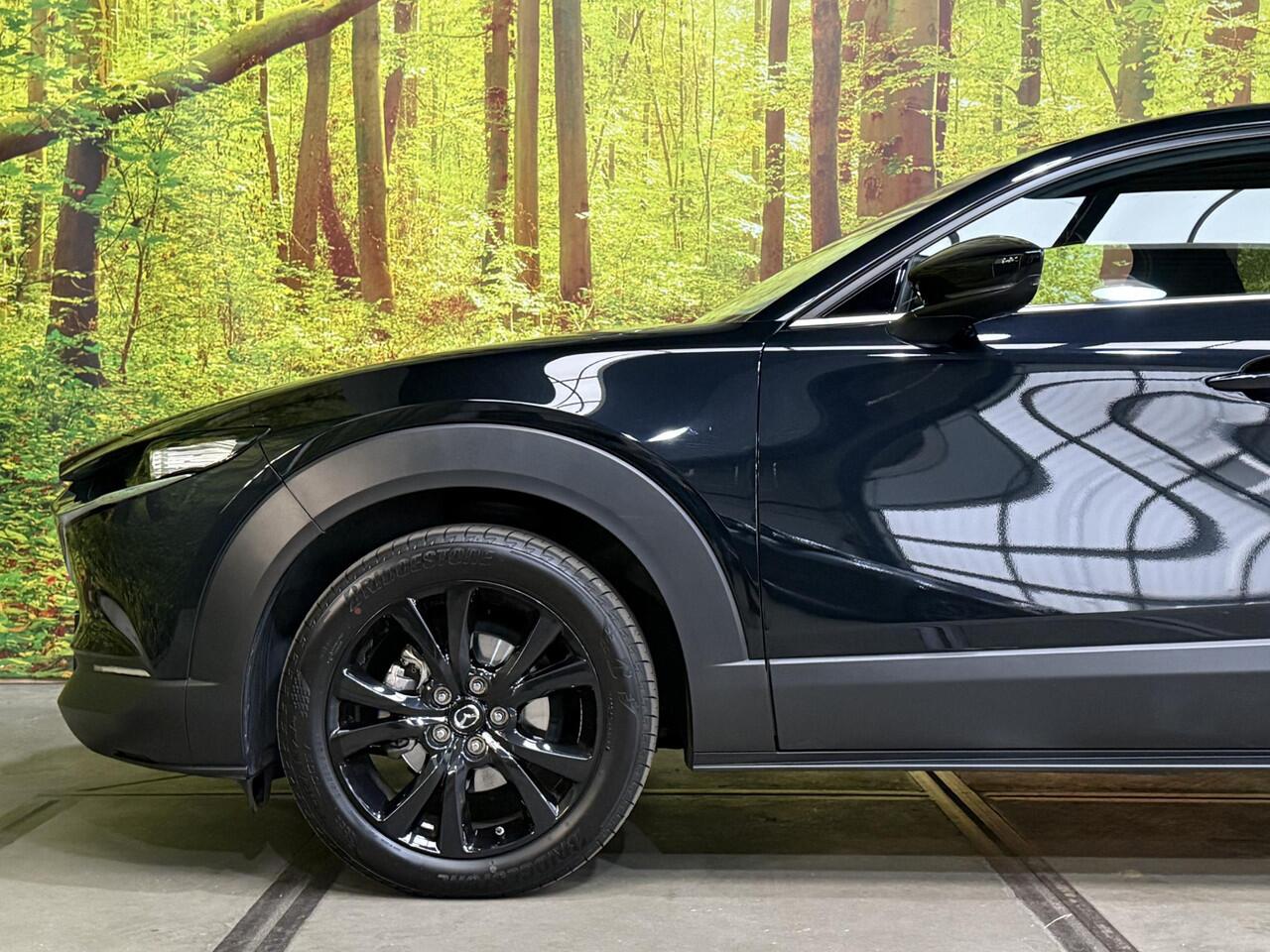 Mazda CX-30 2.0 e-SkyActiv-G M Hybrid Homura Automaat Head Up ACC Elek. Klep Navi Camera Keyless 18 Inch Stoelverw.