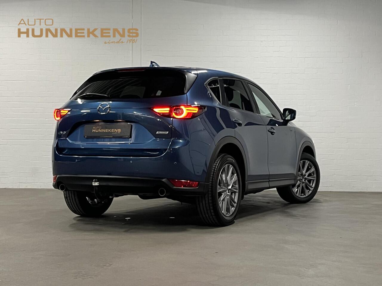 Mazda CX-5 2.0 SkyActiv-G 165 Skylease+ Trekhaak | Cruise-/Climate control | Stuur-/Stoelverwarming | Navigatie | DAB | 19" wielen