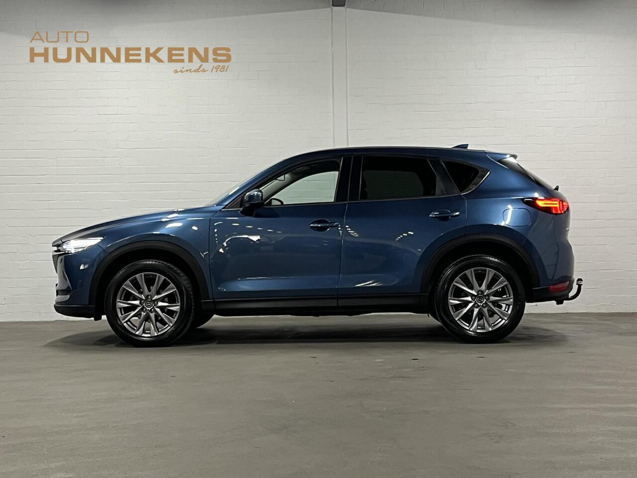 Mazda CX-5 2.0 SkyActiv-G 165 Skylease+ Trekhaak | Cruise-/Climate control | Stuur-/Stoelverwarming | Navigatie | DAB | 19" wielen