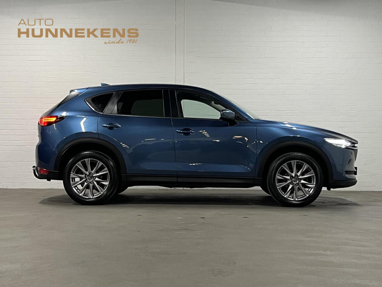 Mazda CX-5 2.0 SkyActiv-G 165 Skylease+ Trekhaak | Cruise-/Climate control | Stuur-/Stoelverwarming | Navigatie | DAB | 19" wielen