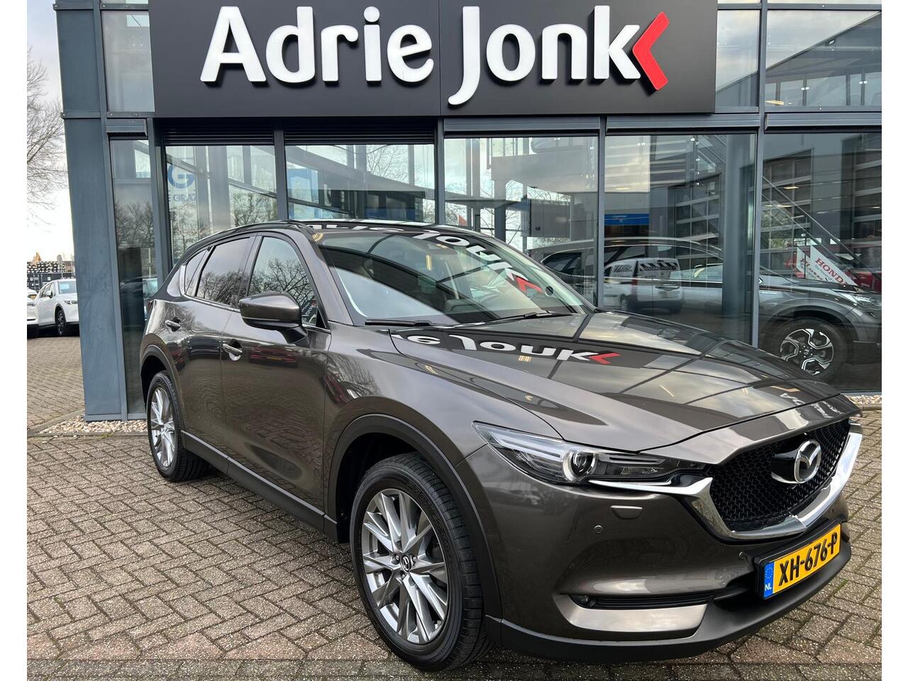 Mazda CX-5 2.0 SkyActiv-G 165 Skylease Luxury AUTOMAAT | TREKHAAK | 360 CAMERA | NAVIGTIE | EL.A.KLEP | APPLE CARPLAY / ANDROID AUTO | LEDER | Bose AUDIO | HEAD-UP DISPLAY |