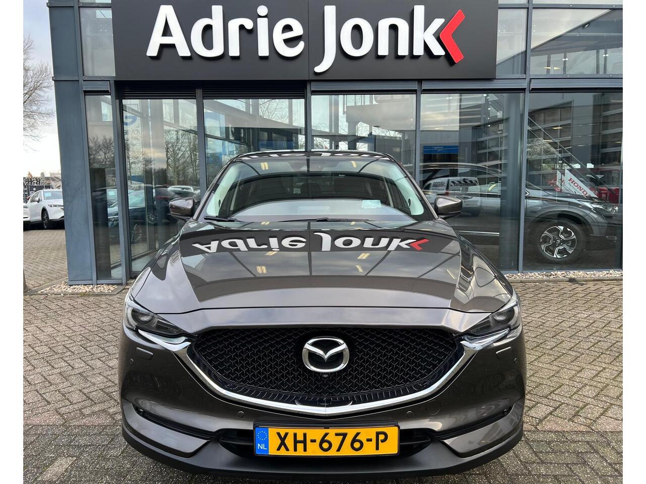 Mazda CX-5 2.0 SkyActiv-G 165 Skylease Luxury AUTOMAAT | TREKHAAK | 360 CAMERA | NAVIGTIE | EL.A.KLEP | APPLE CARPLAY / ANDROID AUTO | LEDER | Bose AUDIO | HEAD-UP DISPLAY |