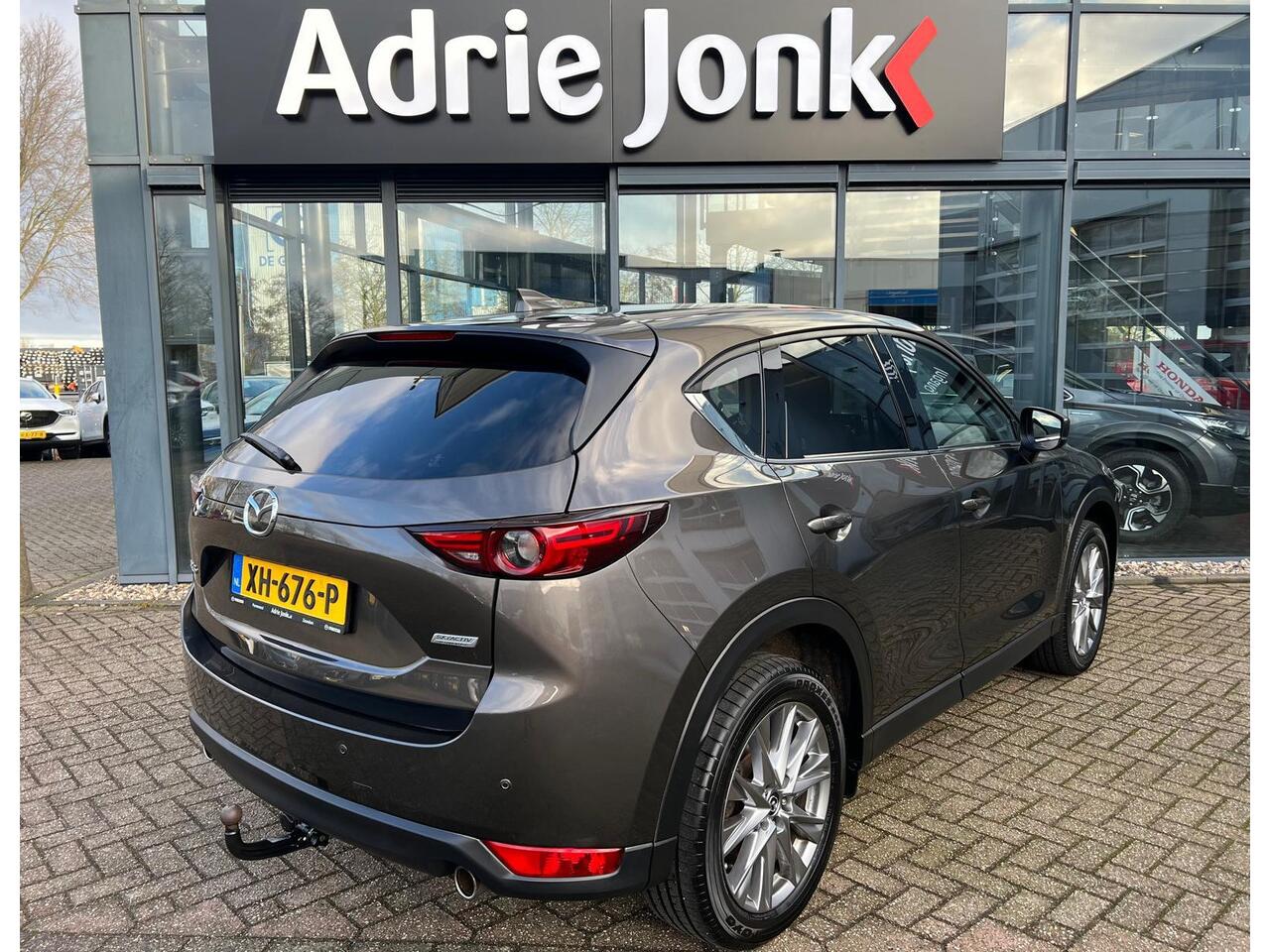 Mazda CX-5 2.0 SkyActiv-G 165 Skylease Luxury AUTOMAAT | TREKHAAK | 360 CAMERA | NAVIGTIE | EL.A.KLEP | APPLE CARPLAY / ANDROID AUTO | LEDER | Bose AUDIO | HEAD-UP DISPLAY |