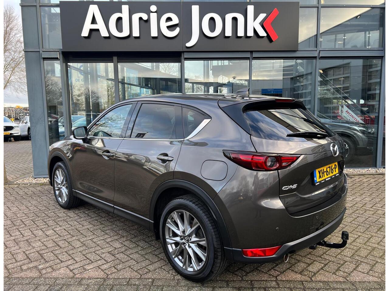 Mazda CX-5 2.0 SkyActiv-G 165 Skylease Luxury AUTOMAAT | TREKHAAK | 360 CAMERA | NAVIGTIE | EL.A.KLEP | APPLE CARPLAY / ANDROID AUTO | LEDER | Bose AUDIO | HEAD-UP DISPLAY |