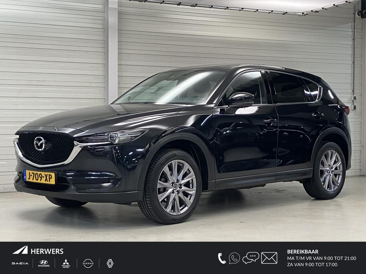 Mazda CX-5 2.0 SkyActiv-G 165 Business Luxury / Eerste Eigenaar / Trekhaak 2000 KG / Lederen Bekleding / Memory Seats / HUD / Bose Audio / Stoelverwarming en Ventilatie / Navigatie / Camera /