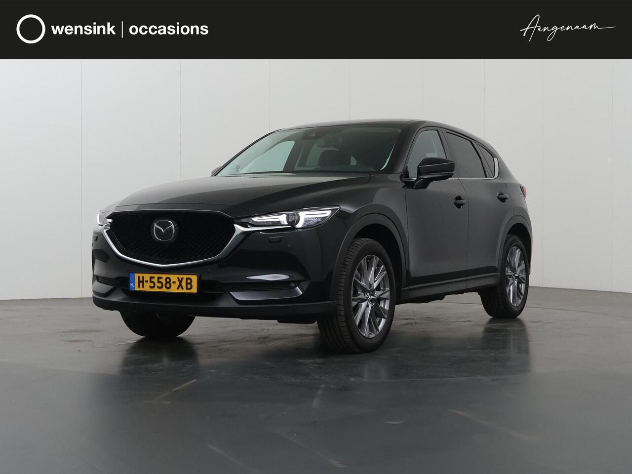 Mazda CX-5 2.0 SkyActiv-G 165 Luxury | 2000kg trekgewicht | Trekhaak | Navigatie | Stoelverwarming/koeling | Ele. verstelbare stoelen + geheugen | 360 Camera | DAB | Apple Carplay/Android Auto | HUD | Bose Audio |