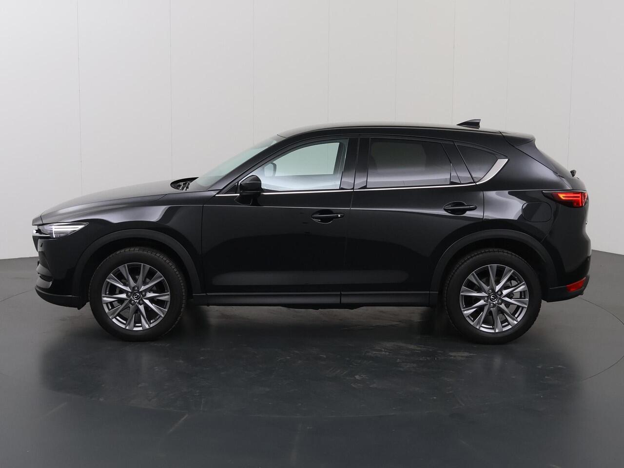 Mazda CX-5 2.0 SkyActiv-G 165 Luxury | 2000kg trekgewicht | Trekhaak | Navigatie | Stoelverwarming/koeling | Ele. verstelbare stoelen + geheugen | 360 Camera | DAB | Apple Carplay/Android Auto | HUD | Bose Audio |